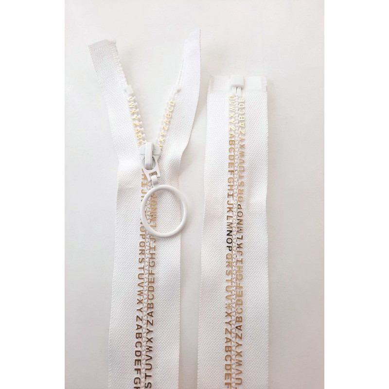 Dlouhý zip dělitelný - písmenka 65 cm, zuby 8 mm, bílá/zlatá
